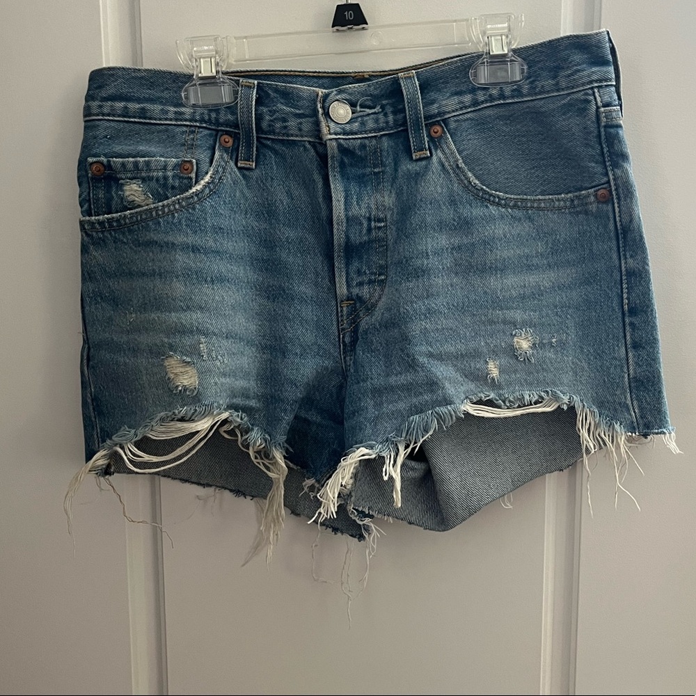 Levi’s high rise distressed denim shorts